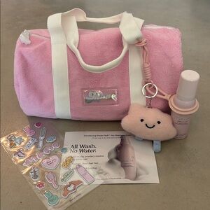 New Mane Haircare Bundle: gym duffel bag, dry shampoo foam, plushy & stickers